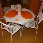 Orange Flower Apartments